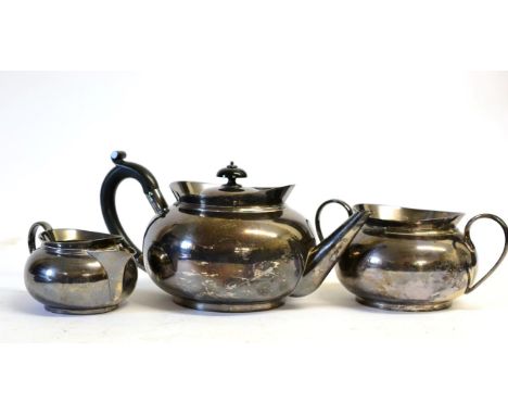 A Late Victorian Silver Three Piece Tea Service, Hukin & Heath, London 1895, retailed by Carrington & Co, plain circular form