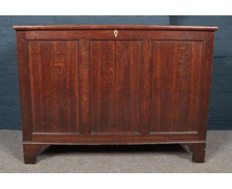 A Georgian Oak Panelled Coffer - with ivory key hole surround. H: 91cm, W:124cm, D:49cm.  