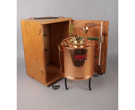 A Stanhope-Seta flash tester in copper together with original wooden box and thermometer Serial no 13030-0.  