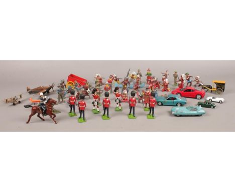 A collection of mainly vintage toy soldiers. To include Britains collectors figures, Corgi 'Lotus', Tomica Dandy 'Celica', Ma