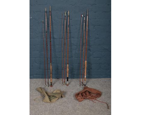 Three vintage split cane fishing rods. Includes J.A Walker, Eaton &amp; Deller example in canvas bag and one other.  