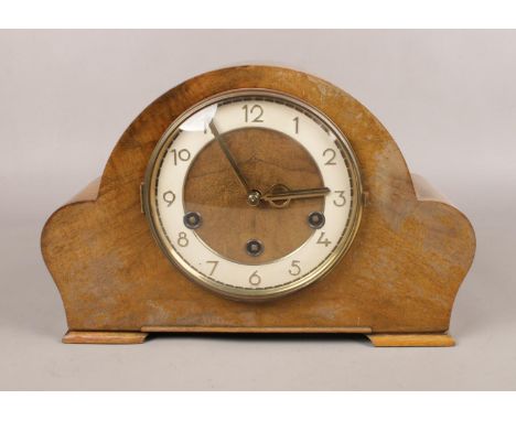 A carved Oak eight day dome top Westminster/Whittington chime mantle clock  