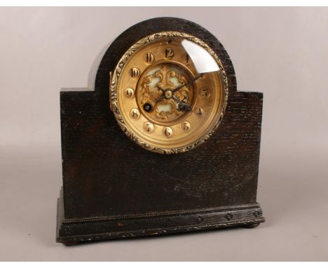 A 19th Century French Oak Mantle Clock, with Madaille D'Argent - L Marti 1889 movement. Retailed by Benefink &amp; Co London.