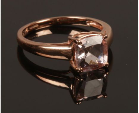 A 9ct rose gold ring set with pale pink square cut gemstone. Size K. Weight 1.90g.  