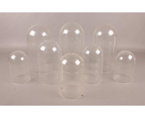 Eight plastic clock domes.  