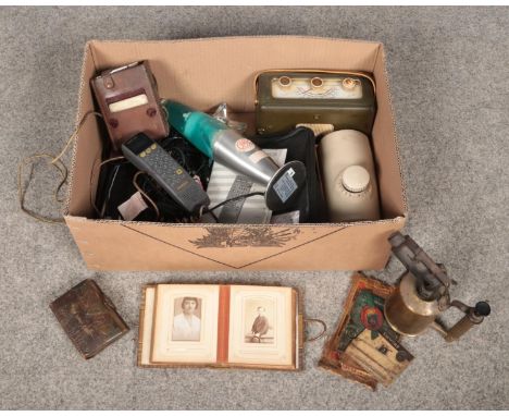 A box of miscellaneous. Includes Victorian photograph album, Sievert blow lamp, Roberts radio etc.  