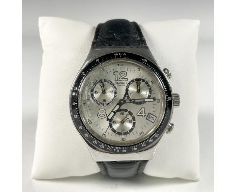 The watch has a stainless steel 39.5mm case with a crown and two push buttons. There is a black tachymeter bezel and silver f