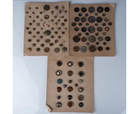 3 cards of 115 buttons in various sizes, materials, and themes. Themes includes a botanical, and a floriated motif. The small