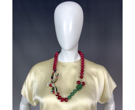 This stunning asymmetrical statement necklace showcases a beautifully crafted French antique pin from Le Marais, Paris. The c
