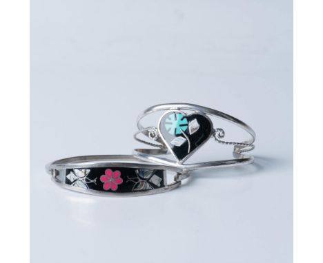 Two beautiful silver bracelets inlaid with enamel and mother of pearl. The cuff measures approximately 4.75" around the insid