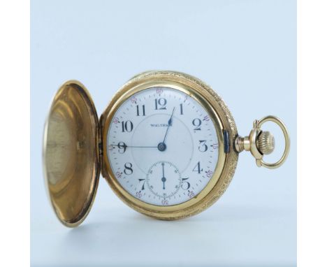This exquisite Waltham Riverside pocket watch is housed in a finely crafted 14K gold case, adorned with delicate heart-shaped