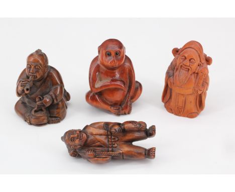 Three figural carved wood netsuke together with a similar monkey netsuke, tallest 5 cm
