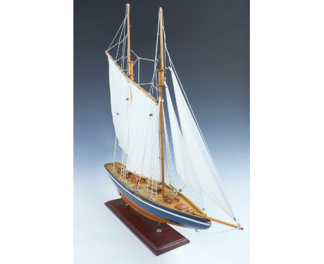 A wooden model yacht, 80 x 74 cm