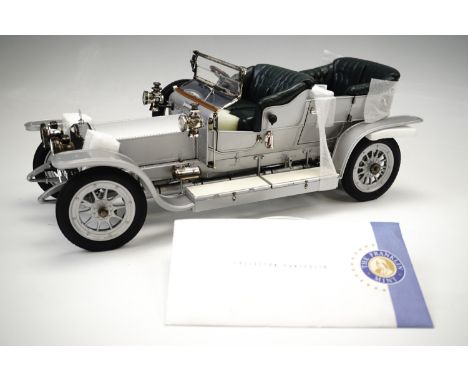 A Franklin Mint "Connoisseur's Series" 1:12 scale die-cast premier edition Rolls Royce 1907 silver ghost 