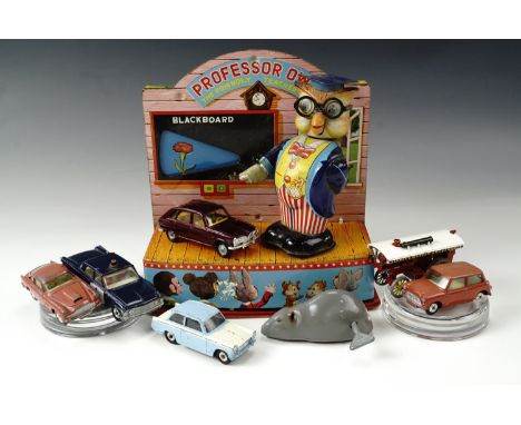 Professor Owl the Friendly Teacher together with Corgi die-cast cars and a Tri-ang Minic mouse toy