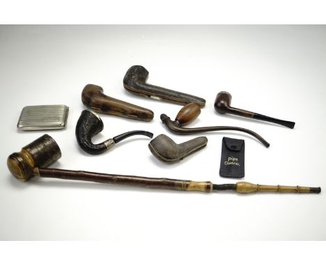 Seven early to mid 20th Century tobacco pipes, three cased, one with silver mounts, together with a pipe cleaner, and a cigar