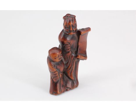 A Japanese boxwood netsuke of Kanzan and Jittoku, 5 cm
