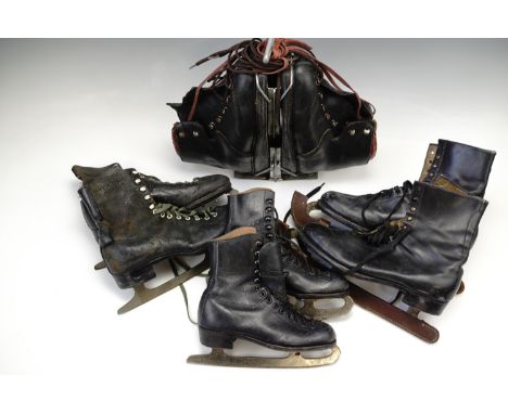 Three pairs of vintage ice skates together with ski boots 