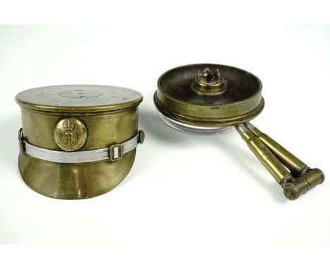 A Great War trench art British army peaked cap, fabricated from a 1916 18-pr shell case and bearing a Medical Corps button in