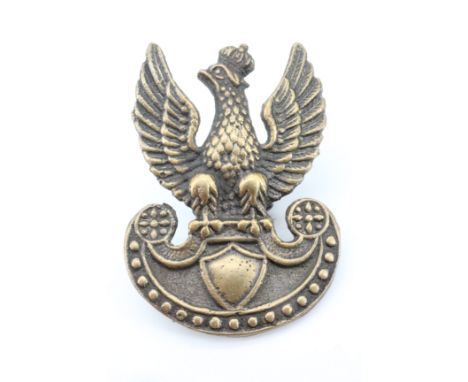 A Second World War Free Polish army cap badge in cast brass, with screw back, 39 mm