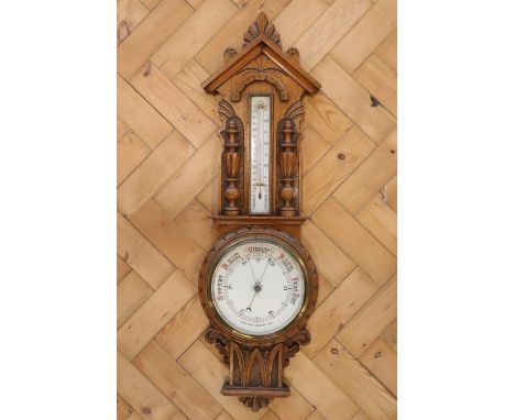 A carved oak banjo barometer, 90 cm