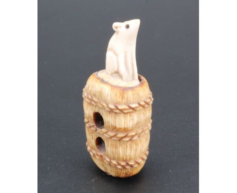 A Japanese stag horn netsuke of a mice on a rice bale, 5 cm