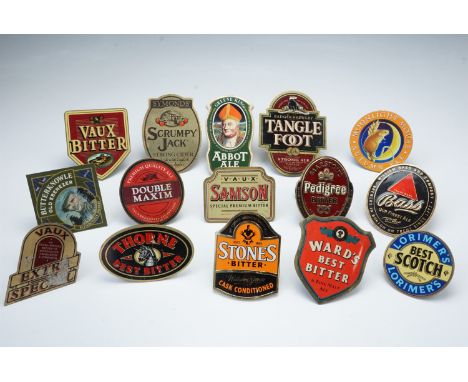 A quantity of pub beer engine tap signs