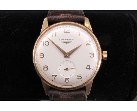 An early 1970 Longines 9 ct gold wrist watch, having a calibre 370 17-jewel manual wind movement, its circular frosted-silver