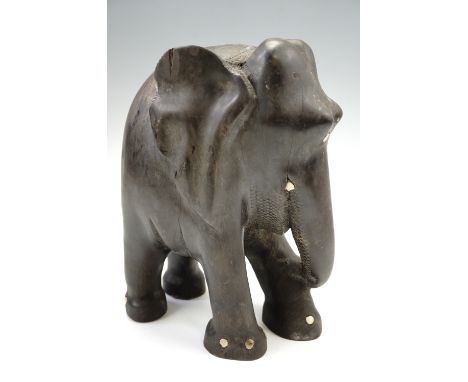 A carved wooden lamp base in the form of an elephant, 31 cm