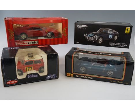 Four boxed 1:18 scale die-cast cars; Hot Wheels Elite 250 GT Berlinetta, Maisto Jaguar XK180, Ferrari GTO and Morris Mini Coo