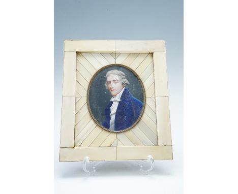 An ivory portrait miniature of a gentleman wearing a blue overcoat and cravat signed Ziegler, in a piano key frame, overall 2
