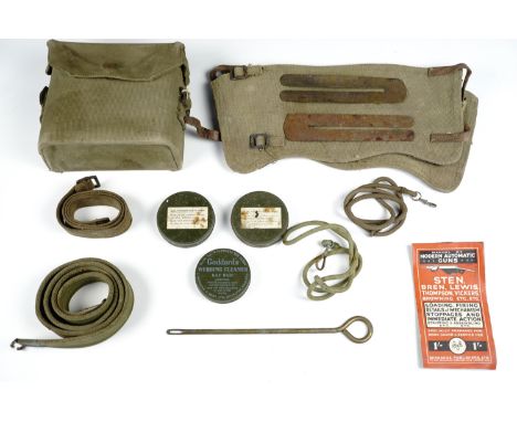 A group of largely Second World War military kit including a webbing binoculars case, lanyards, a small arms training manual 