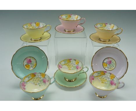 Six Paragon "Smiling June" cups and saucers