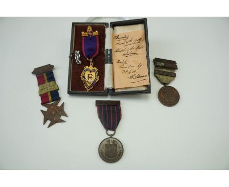 A cased Independent Order of Oddfellows Manchester bar-mounted enamelled medal together with two Lucas Tooth Boys Training Fu