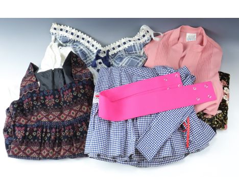 A small quantity of vintage ladies' clothing including skirts, dressers etc