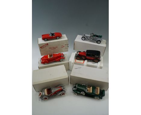 Six boxed die-cast model cars; 1934 Packard V12, 1962 Chevrolet Corvette, 1932 Cadillac V16, 1907 Rolls Royce Silver Ghost, 1