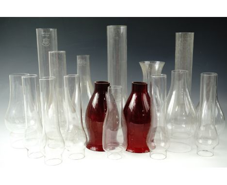 A large quantity of Sun Brand and other glass oil lamp funnels, largest 30 cm