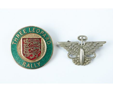 An early 20th Century automobile association nickel lapel badge together with a rally badge