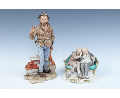 Two Capo-Di-Monte figurines, man with cigar and bottle together with two gentleman on a sofa, first 28 cm and (a/f)