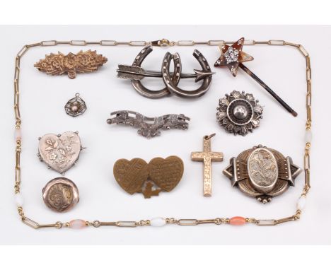 A group of largely Victorian and early 20th Century jewellery including an Aesthetic silver heart shaped plaque brooch, a Miz