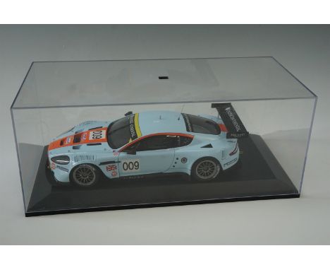 A cased Auto Art 1:18 scale die-cast Aston Martin DBR9