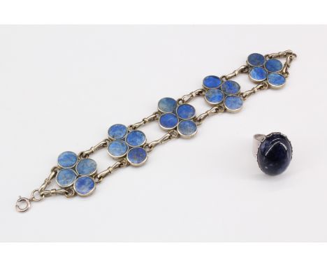 A lapiz lazuli bracelet, comprising five panels of round disks of lapiz set in white metal, 19 cm, together with a cabochon r