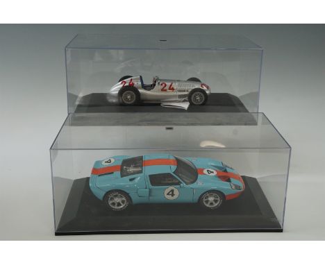 A cased Ford GT 1:18 scale model together with a CMC Mercedes