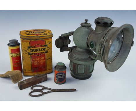 A Lucas "King of the Road" carbide lamp together with a Dunlop tyre repair kit etc