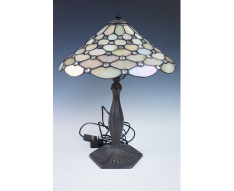 A early 20th Century bronzed table lamp with Tiffany influenced leaded glass shade, 50 cm