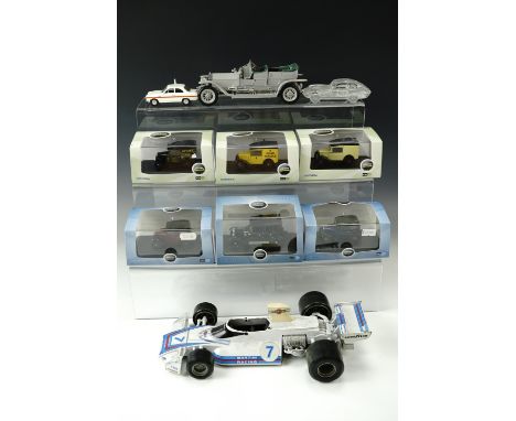 Six cased 1:43 scale Oxford die-cast model cars, Martini F1 racing cars etc