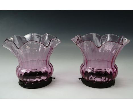A pair of achromatising pink glass gas lamp shades, 15 cm 