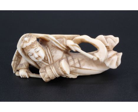 A Japanese ivory netsuke of a Tennin playing a drum, 5.5 cm