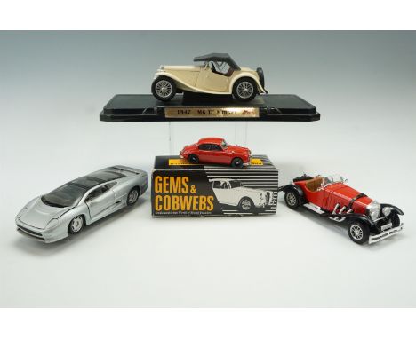 Three die-cast model cars; Jaguar XJ220, Mercedes SSK, 1947 MG TC Midget and a boxed Jaguar MK2 John Coombes special