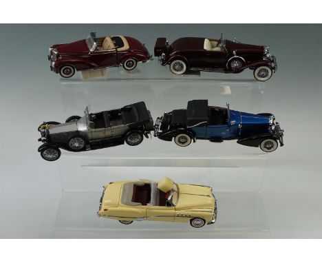 Five Franklin Mint die-cast model cars; 1935 Duesenberg J, 1949 Buick Roadmaster, 1933 Duesenberg J. Victoria, 1957 Mercedes 